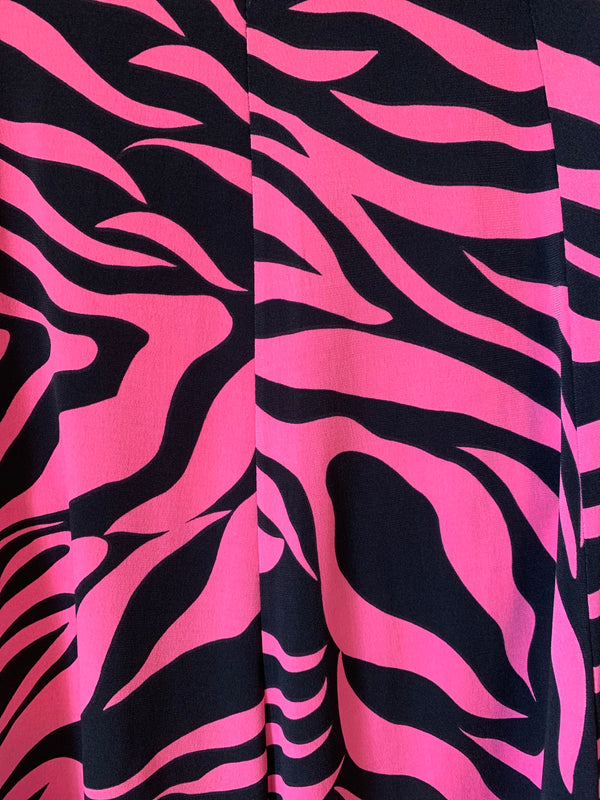 Fabric with pink and black zebra pattern
