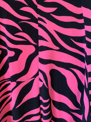 Fabric with pink and black zebra pattern