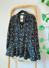 מכופתרת לערב של כוס יין