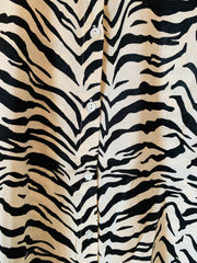 מכופתרת מזוברת ממכרת